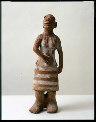 Pregnant Figure Holding Stomach by Reinata Sadhimba