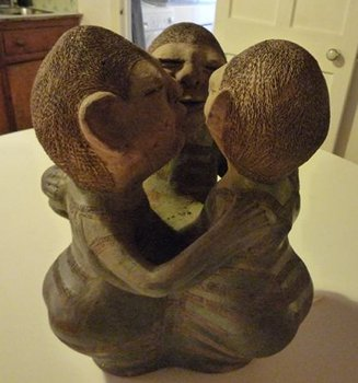 Three Female Figures Embracing by Reinata Sadhimba